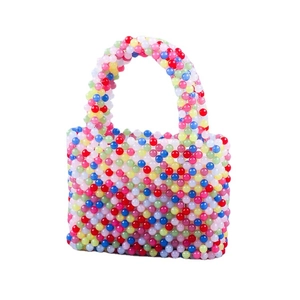 Handmade colorful beaded handbag with rainbow gradient round beads and top handle