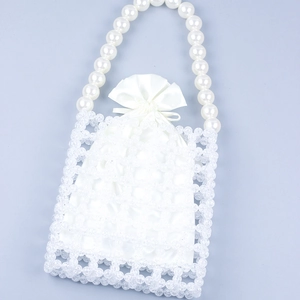 Elegant white handmade beaded handbag with pearl handle and inner drawstring pouch