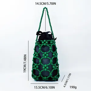 Detailed size chart for the handmade beaded handbag showing dimensions and handle height