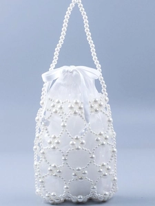 Handmade cream white beaded pearl tote bag with floral hollow pattern and satin liner