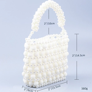 Detail view of pearl beaded handbag dimensions with height 14.5cm and width 15.5cm