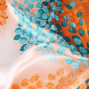 70cm printed silk scarf with vibrant orange and green abstract natural floral patterns