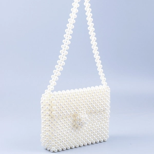 Handmade white pearl beaded square crossbody bag with elegant flap cover and strap