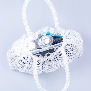 Handmade woven clear beaded handbag featuring a large capacity wavy hobo shape
