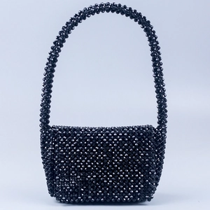Handmade black acrylic beaded handbag with U-shaped handle and woven square evening bag