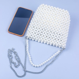 White faux pearl beaded bucket bag with silver chain strap and top handle for women