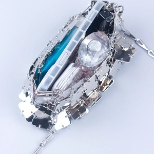 Silver square sequin handmade chain bag showing interior capacity for phone and perfume