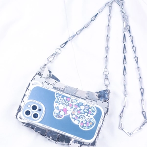 Detail of blue floral iPhone case featuring a silver metallic sequin mesh net and chain