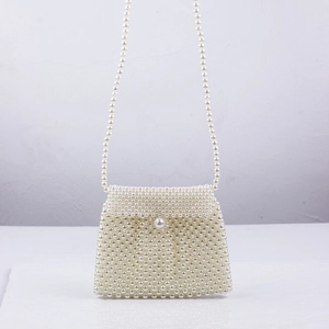 Handmade pearl beaded dumpling crossbody bag with a large decorative pearl buckle