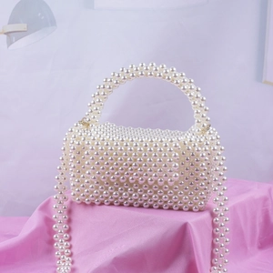 Sac oreiller fait main en perles avec poignée et bandoulière pour femmes élégantes