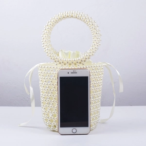 Handmade pearl beaded bucket bag with drawstring satin lining and elegant top handle