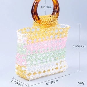 Detailed dimensions of a colorful handmade beaded handbag with resin circle handles
