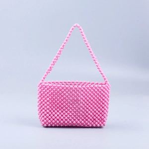 Handmade pink acrylic beaded tote bag with woven design and matching top handle