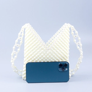 Handmade cream acrylic pearl beaded shoulder bag with V-neck hollow design and strap