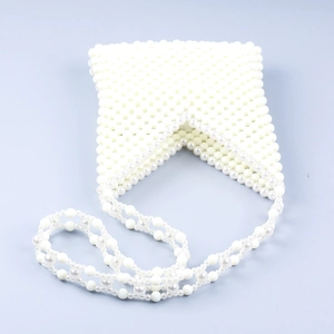 Detailed view of handmade white acrylic beaded crossbody bag with elegant V-neck strap
