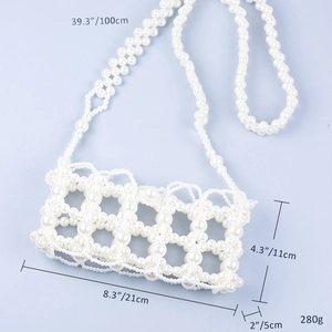 Detailed size guide showing dimensions of the white pearl woven crossbody bag with strap