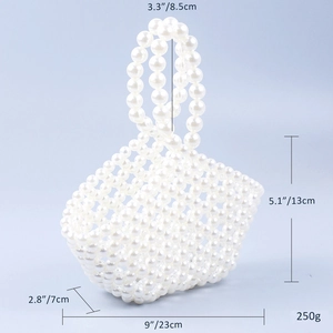 Handmade pearl basket bag with dimensions 23x13x7cm and a handle height of 8.5cm