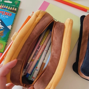 Close-up of fluffy plush hot dog pencil case showing soft texture and spacious zipper opening