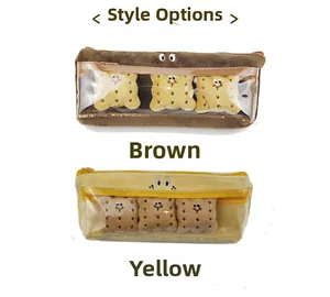 Detail of plush pencil cases with biscuit embroidery and transparent windows