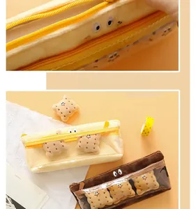 Detail of smooth zipper and cute plush biscuit pencil case with clear PVC window