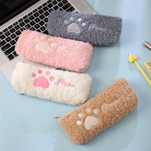 Furry cat paw plush pencil cases in four colors with embroidered Meow detail