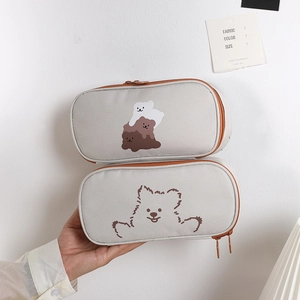 Close-up of cute cartoon bear canvas pencil bags with dual zippers and large capacity