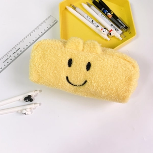 Cute yellow plush pencil case with smiling face embroidery and decorative 3D ears