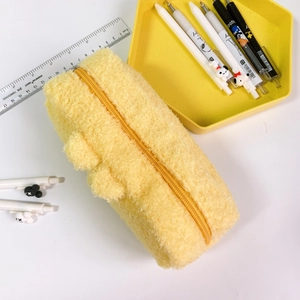 Detail of soft yellow plush pencil case with smooth zipper and high capacity storage