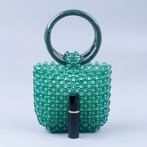 Green acrylic beaded handbag with retro woven pattern and dark green marble ring handle