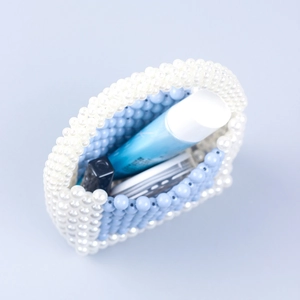 Handmade blue and white acrylic beaded mini handbag with top handle for cosmetics