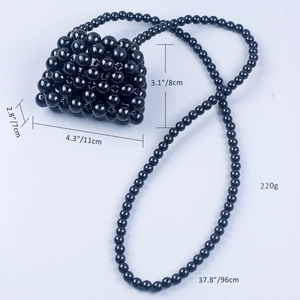 Detailed size parameters of the black beaded mini crossbody bag with glossy finish