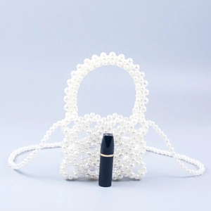 Elegant white faux pearl beaded mini bag with top handle and long crossbody chain strap