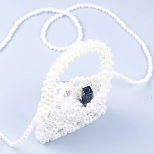 Handmade hollow square faux pearl mini bag with long shoulder strap and interior view
