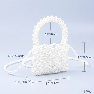 Detail view of cream beaded pearl evening bag showing size dimensions and strap length