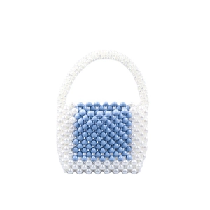 Handmade beaded handbag with blue and white acrylic pearls for a vintage fall style