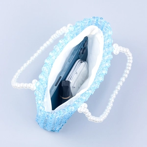 Handmade light blue acrylic beaded handbag with white pearl handle and zip closure