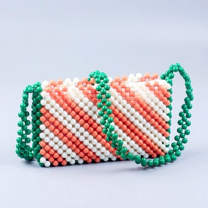 Handmade woven acrylic beaded bag with green white pink stripes and long shoulder strap