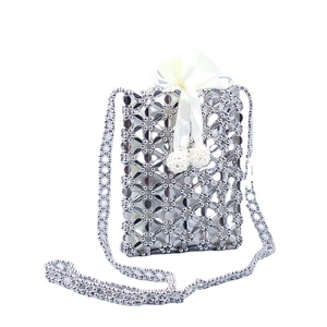 Silver hollow floral beaded crossbody bag with white satin bow and pearl charms