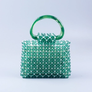 Handmade woven green acrylic beaded handbag with white pearls and resin ring handle