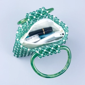 Handmade green acrylic beaded handbag with white faux pearls and top D-ring handle