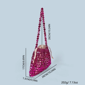 Detailed view of woven beads and satin drawstring lining on fuchsia handbag