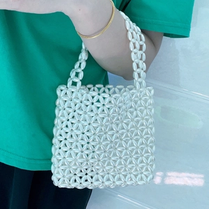 Handmade pearl beaded tote bag with elegant floral weave pattern for women's autumn style