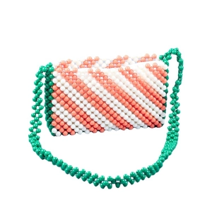 Handmade woven acrylic beaded bag with orange white stripes and green shoulder strap