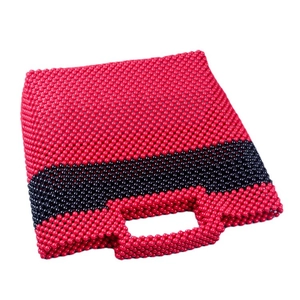 Handmade beaded acrylic tote bag with a red and black color block trapezoid design