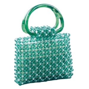 Retro green acrylic beaded handbag with white pearls and D-shaped handles