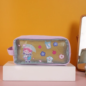 Detail of purple canvas pencil case with transparent sequin window and cartoon illustration
