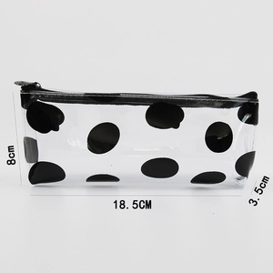 Transparent PVC pencil case with black polka dots and dimensions 18.5cm x 8cm x 3.5cm