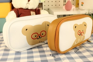 Detailed view of cute bear pencil case showing 22cm length and PU leather texture