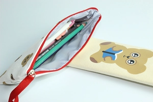 Detailed view of the cute bear pencil case showing its interior and capacity