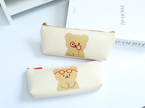 Minimalist cream bear pencil cases in matte PU leather with cute cartoon prints